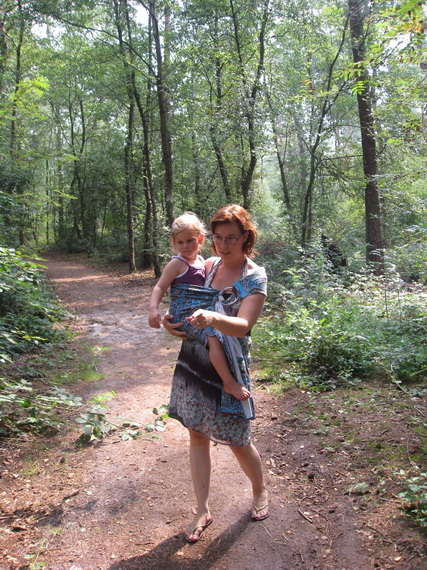 Of bij mama in de draagdoek